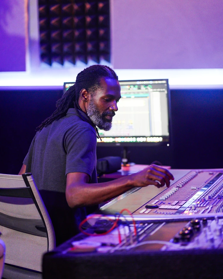 Vision X engineer at the mixing desk