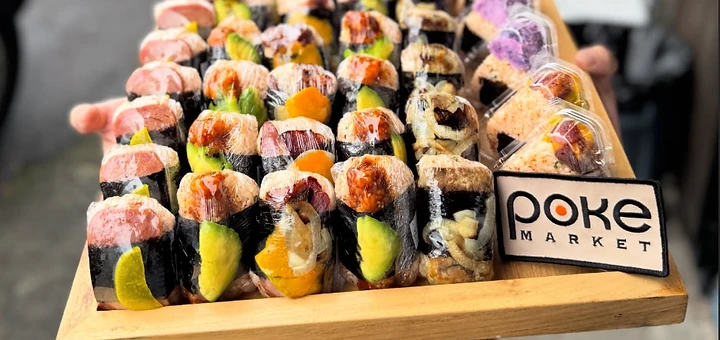 Poke Market catering tray of poke musubi and sushi rolls