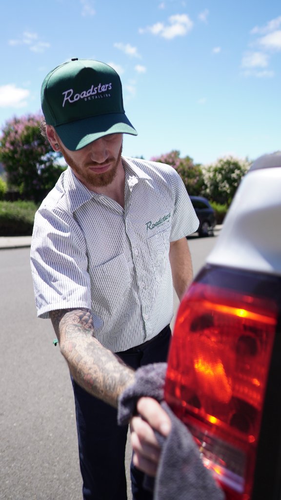 A professionally detailed vehicle gleaming in the sun