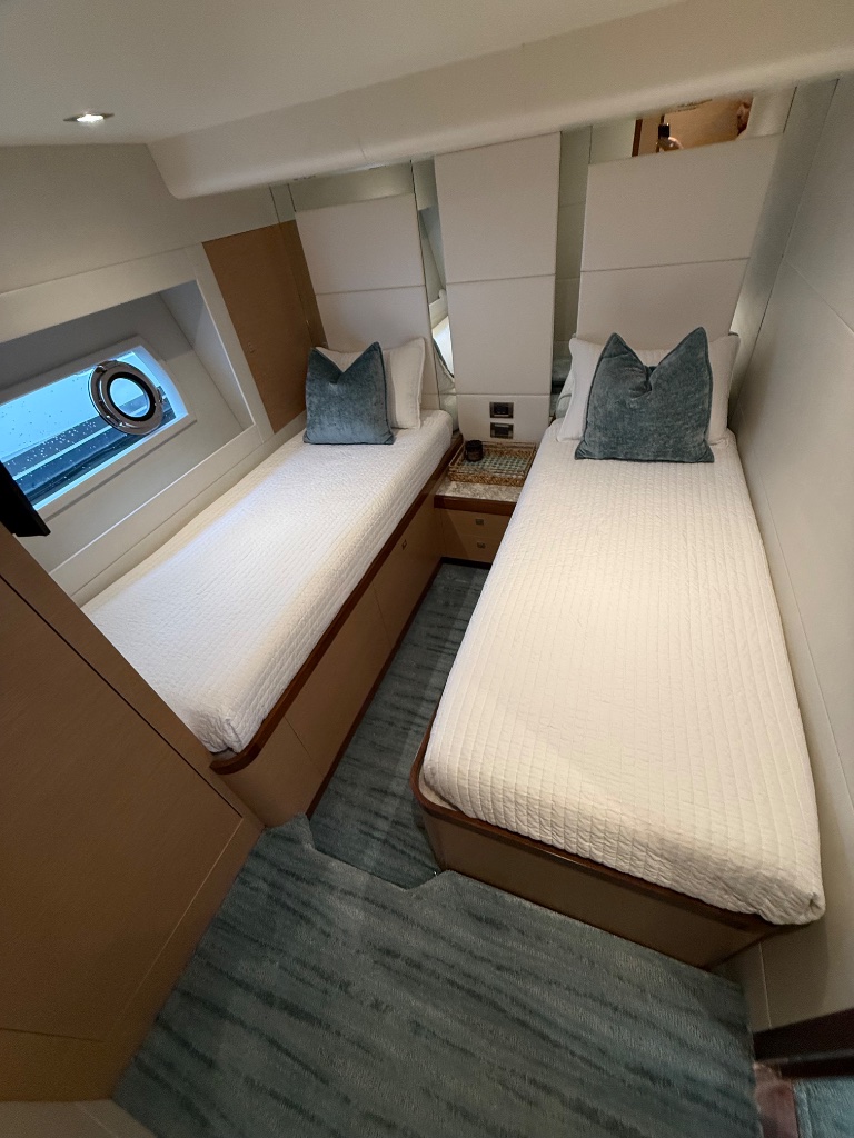 Yacht twin guest cabin cleaned and staged for daily boat show viewings in Fort Lauderdale