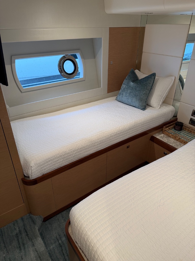 Yacht twin stateroom detailed and presentation-ready before FLIBS