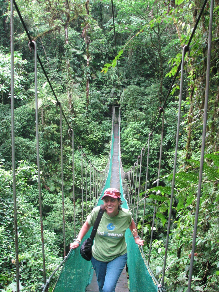 Vanessa on a suspension bridge in the Costa Rican rainforest on her first life-changing trip
