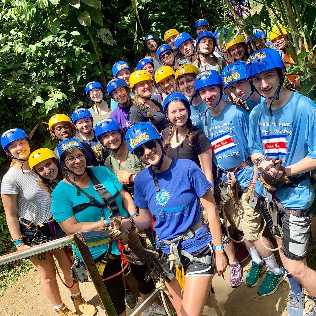 Led2Serve team in harnesses gathered in the Costa Rican jungle