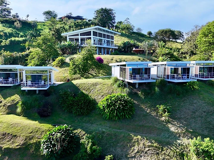 Arenal Lake Bungalows — main house and bungalows on the hillside