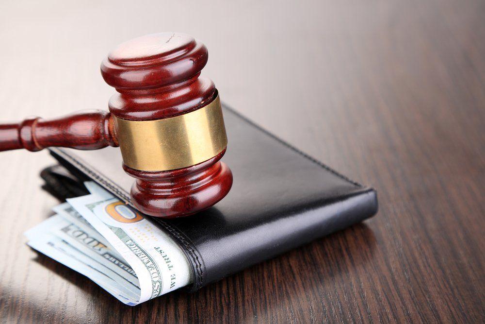 Gavel and wallet representing possible legal remedies.
