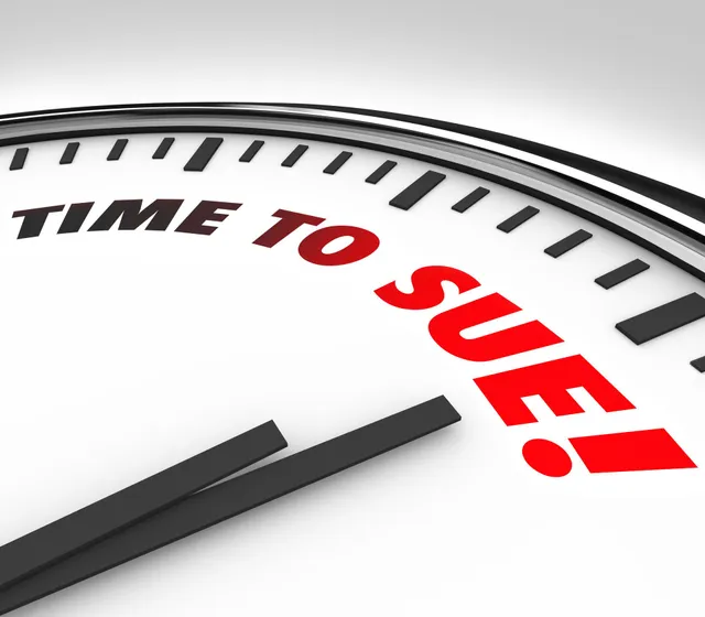 Clock displaying Time to Sue, representing filing deadlines and the time limit to take legal action.
