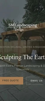 SM Landscaping & Design website shown on an iPhone