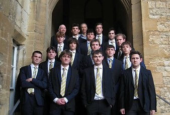 NCAFC members in formal dress on the stone steps