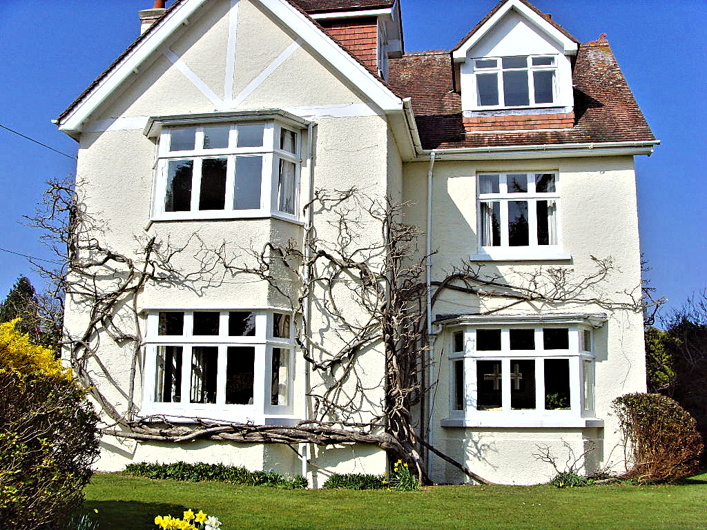 Finished home with a smooth breathable wall coating replacing tired pebbledash
