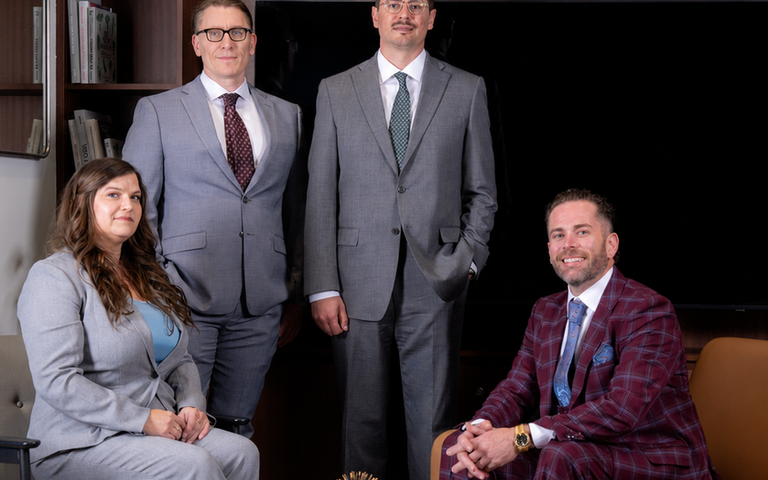 The Majors Law Group legal team in the firm's office lounge