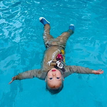 Girl floating during an ISR lesson