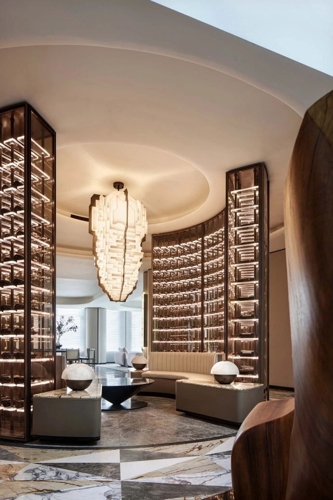 Curved Lounge — Tiered Chandelier