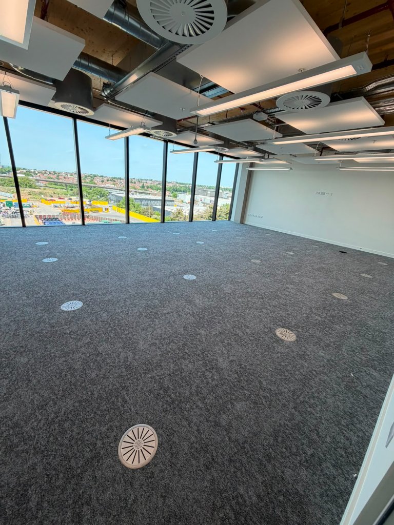 Upper floor — open plan with panoramic views and containment