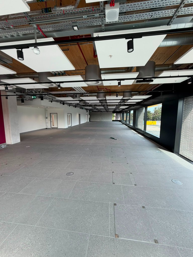 Ground floor lobby — turnstiles and floor boxes