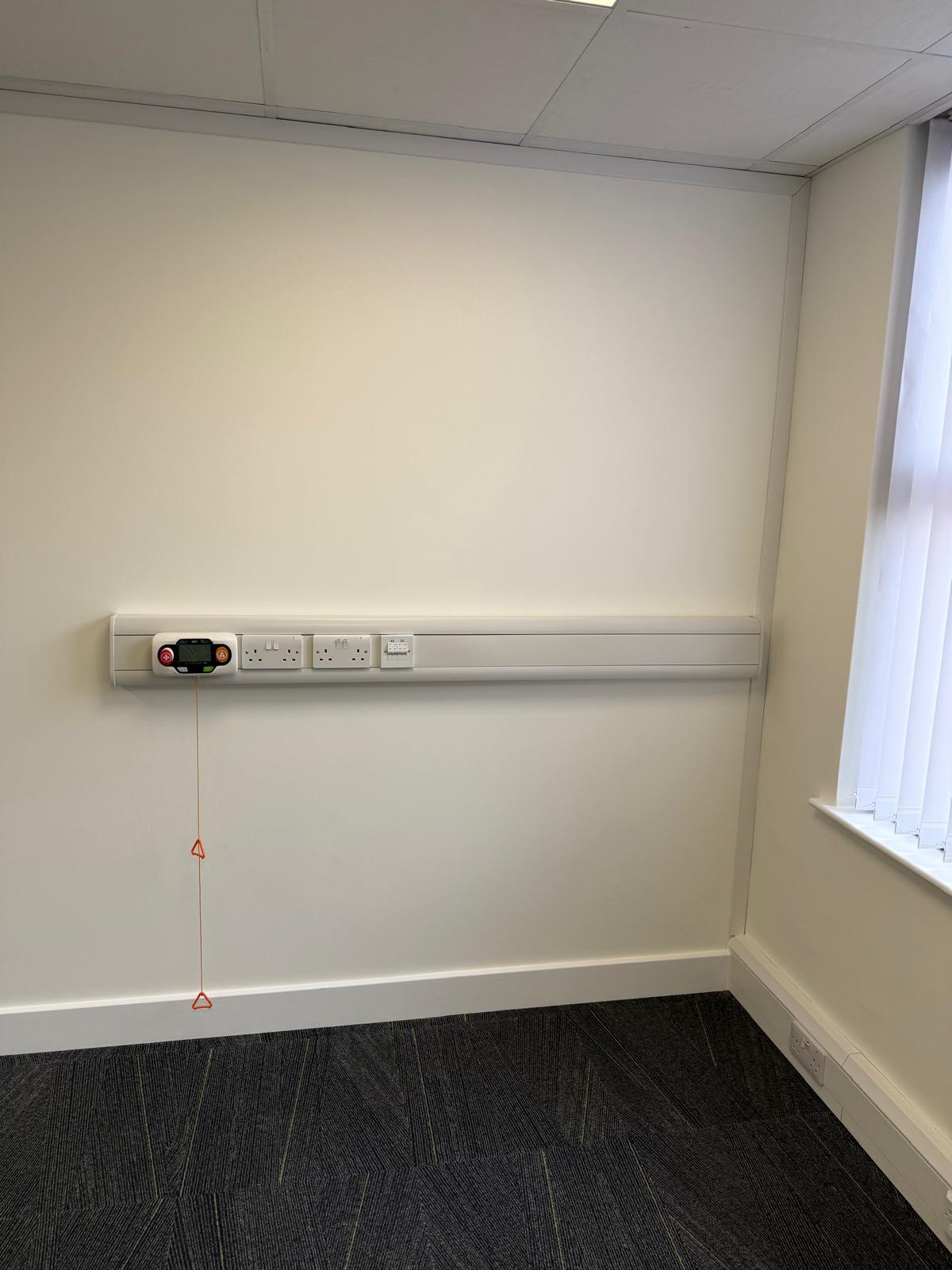Wall trunking detail with nurse call unit and power outlets