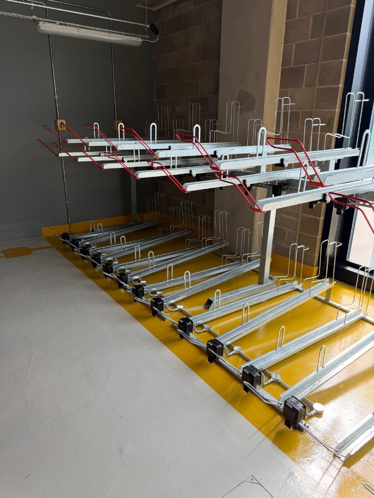 Electric bike store — overhead view of bike rack system