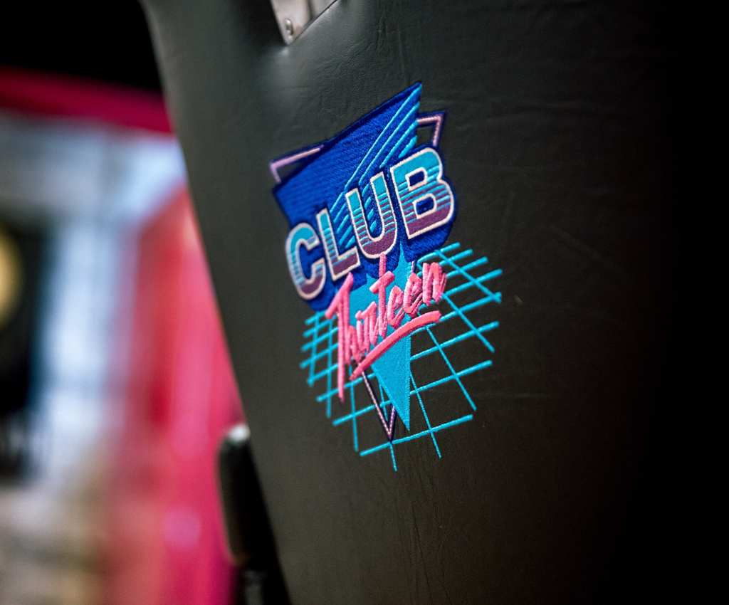Club13 precision haircut portrait with dramatic lighting