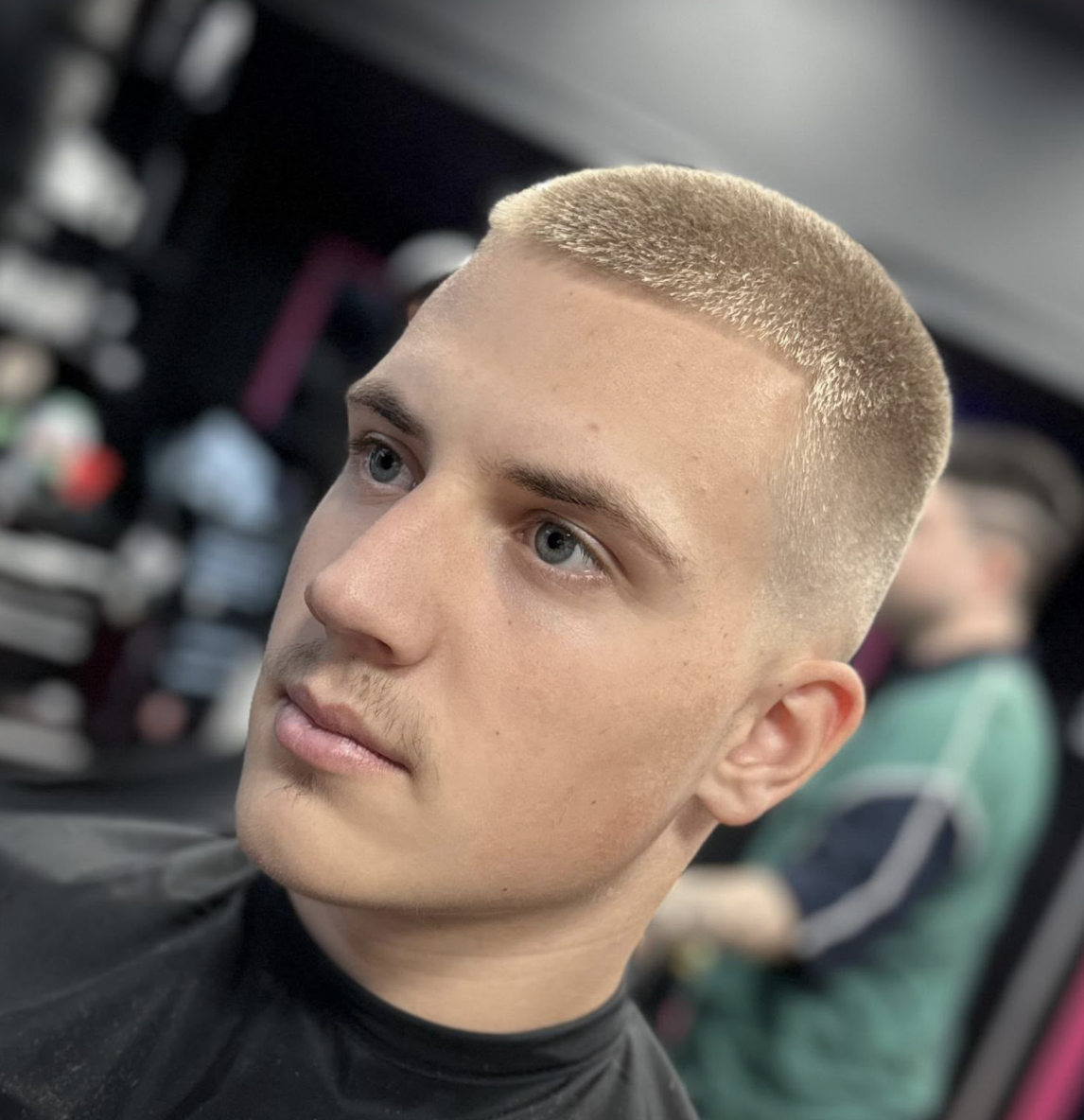 Light-blonde textured buzz cut fade
