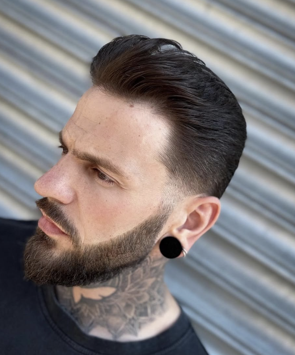 Dark-brown fade with swept-back volume