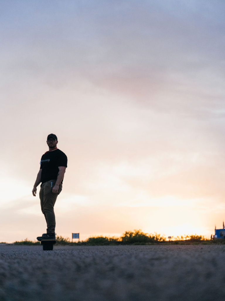 Hunter on a Onewheel at sunset