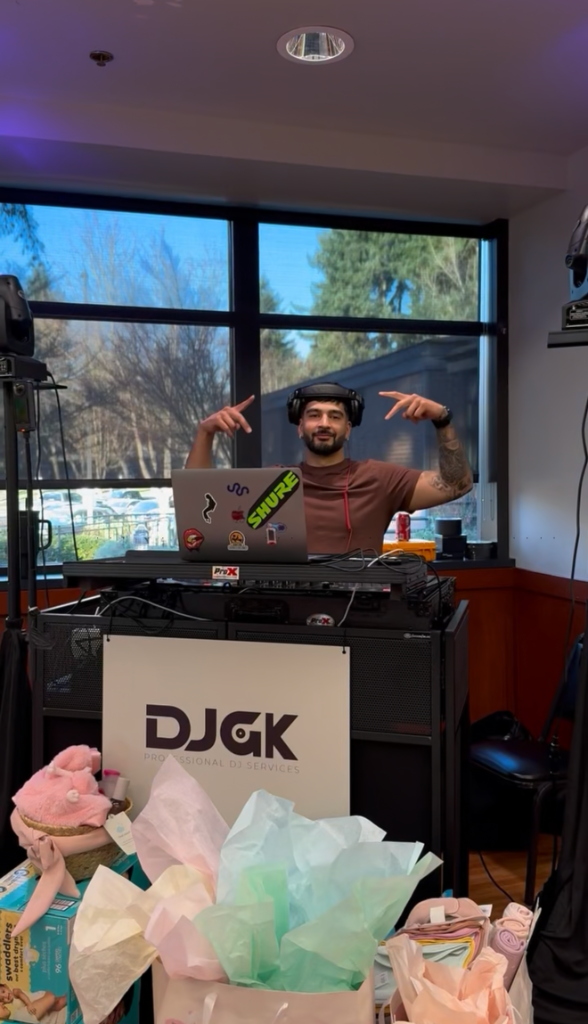 RealDJGK — Professional DJ adjusting headphones during live performance