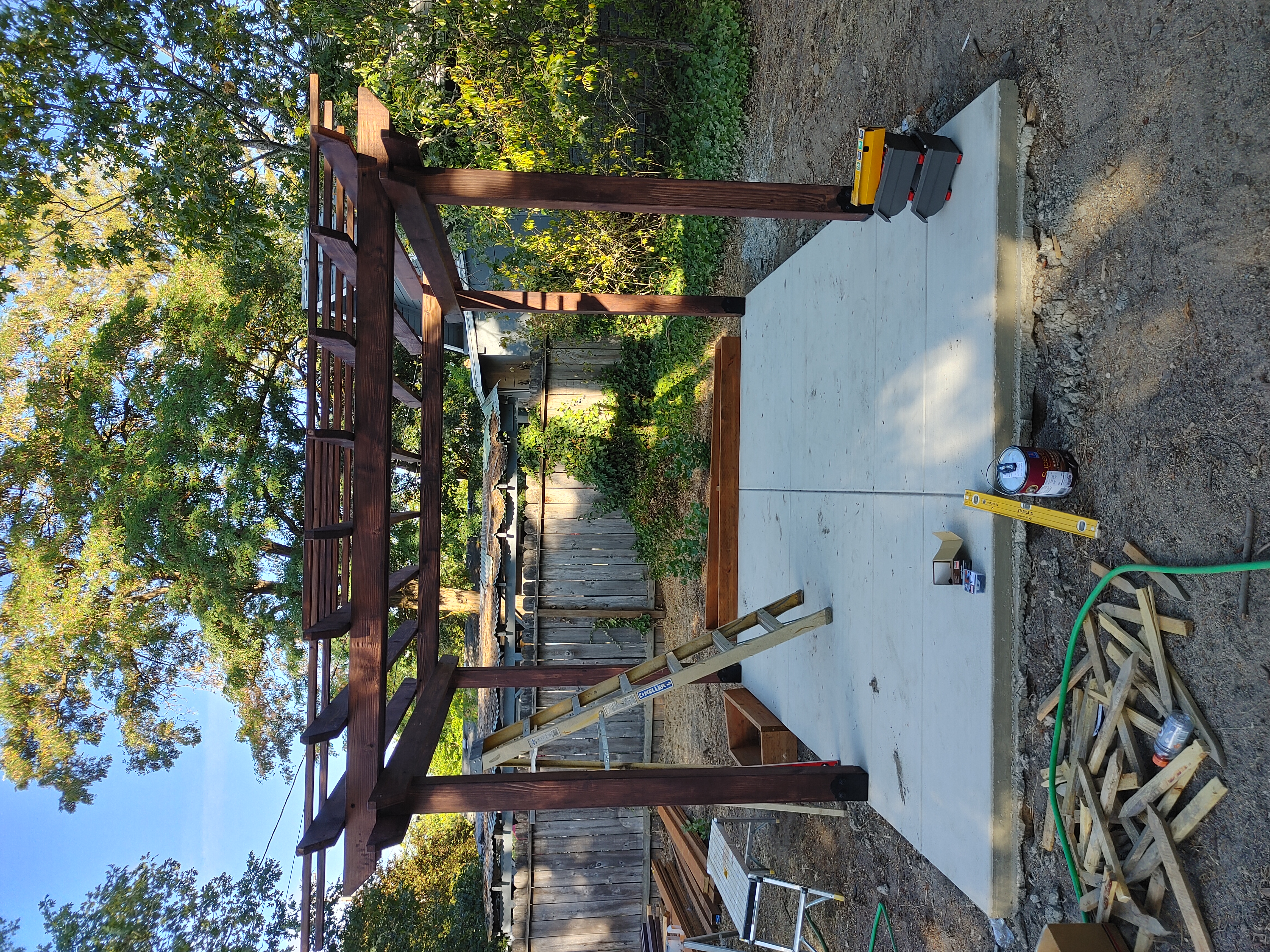 Stained Cedar Pergola on Concrete Patio