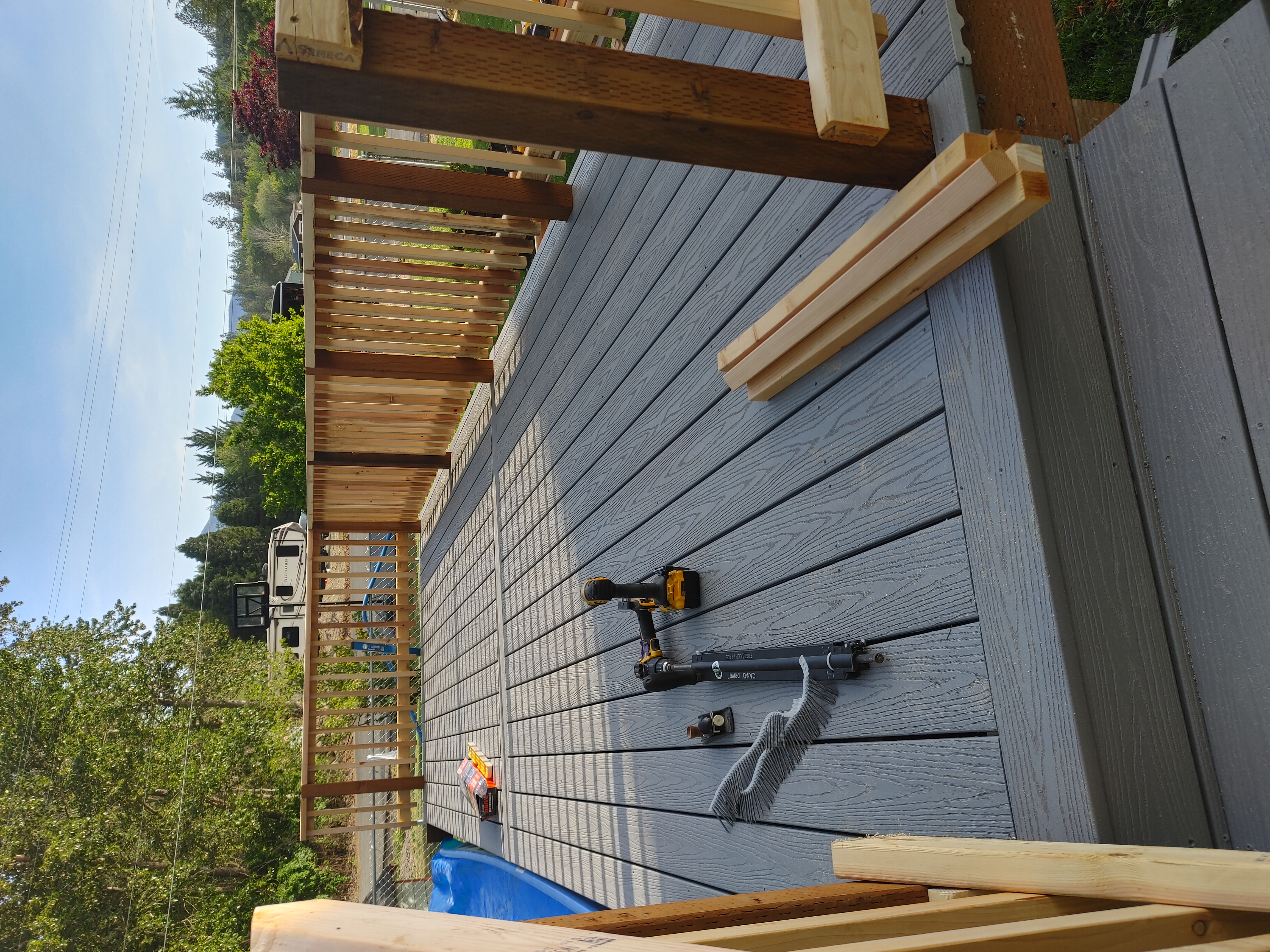 Above-Ground Fiberon Cottage Pool Deck with Cedar Handrail 3