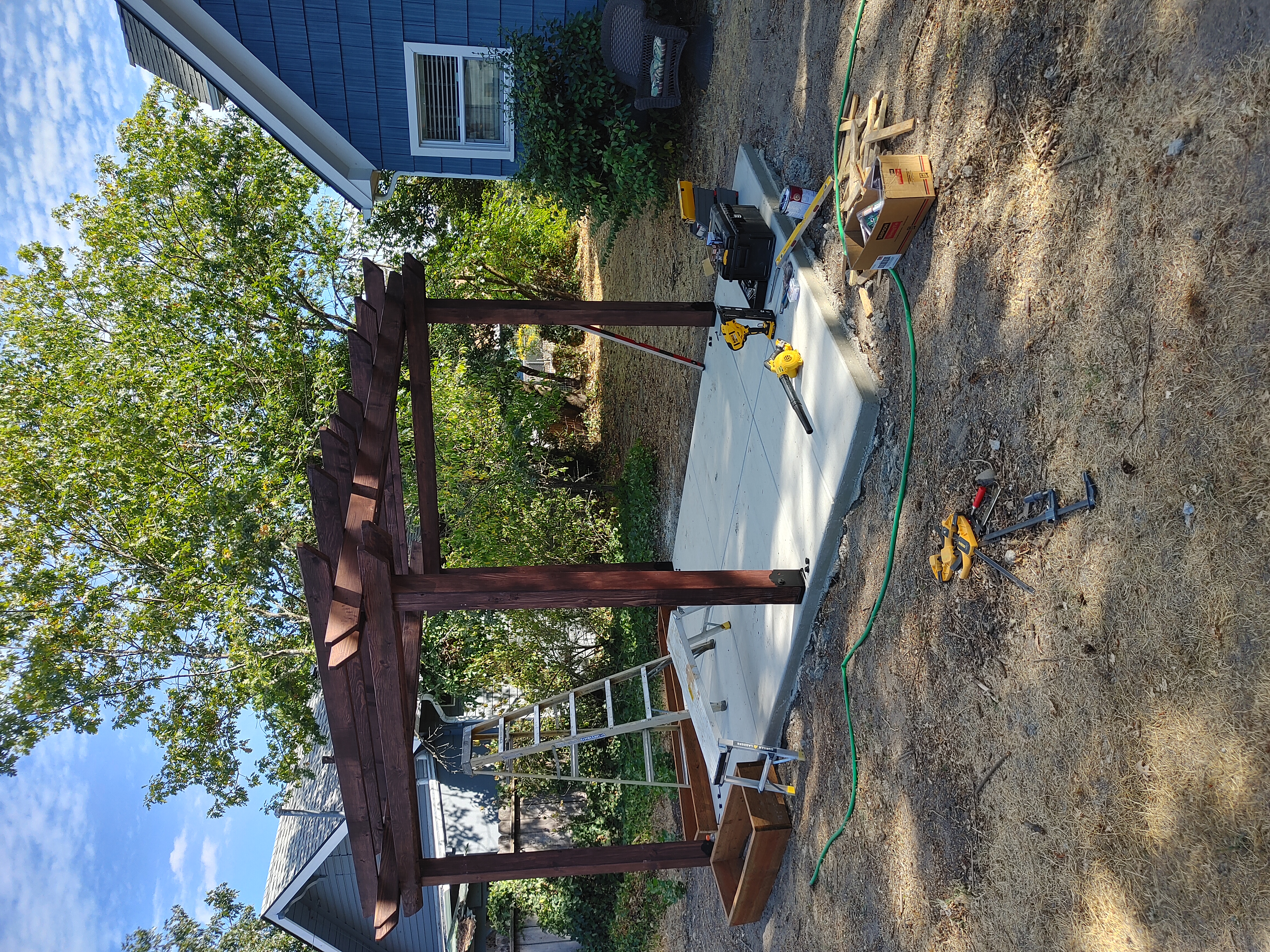 Stained Cedar Pergola on Concrete Patio 4