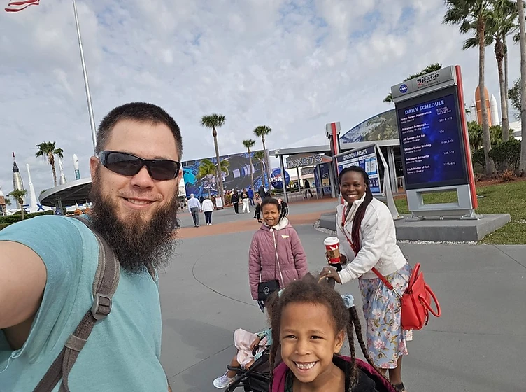 Levi Whitney with his wife and three daughters at the Kennedy Space Center Visitor Complex