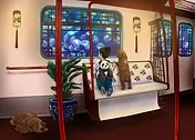 Playful Card by DWD - illustration of a cozy train compartment featuring a child holding a plush panda, accompanied by two dogs, creating a sense of companionship and comfort