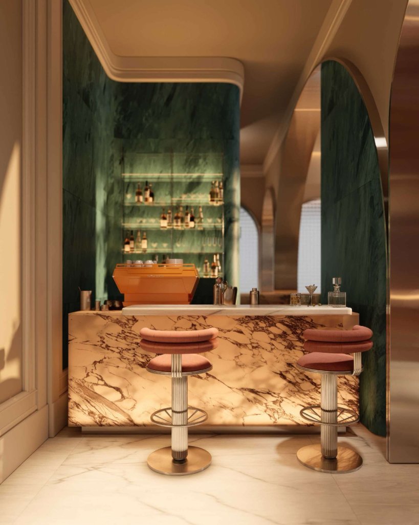 Lounge bar interior with marble counter and velvet stools at Le Château Piétrus
