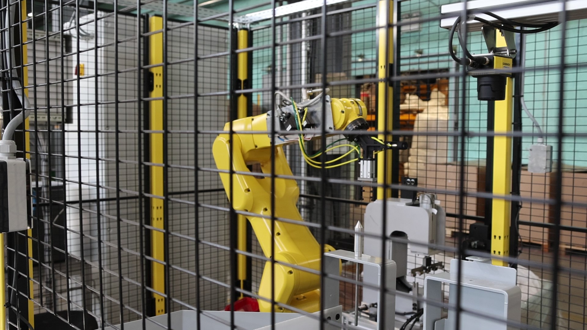Bras robotisé dans l'atelier Platex