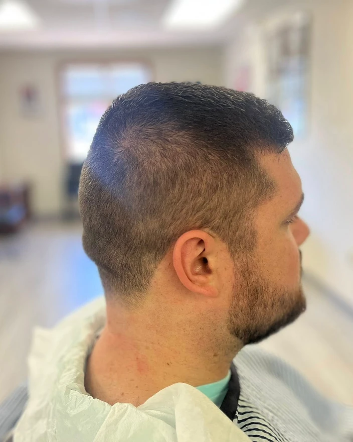 Matthew Paul cutting hair at Hairlines Barbershop, the trusted barbershop in Flemington NJ