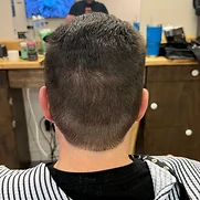 Taper fade back view with clean rounded neckline — haircut by Matthew Paul at Hairlines Barbershop, Flemington NJ