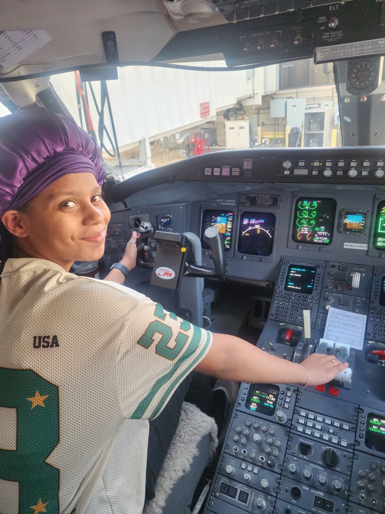 Aubrey in the cockpit