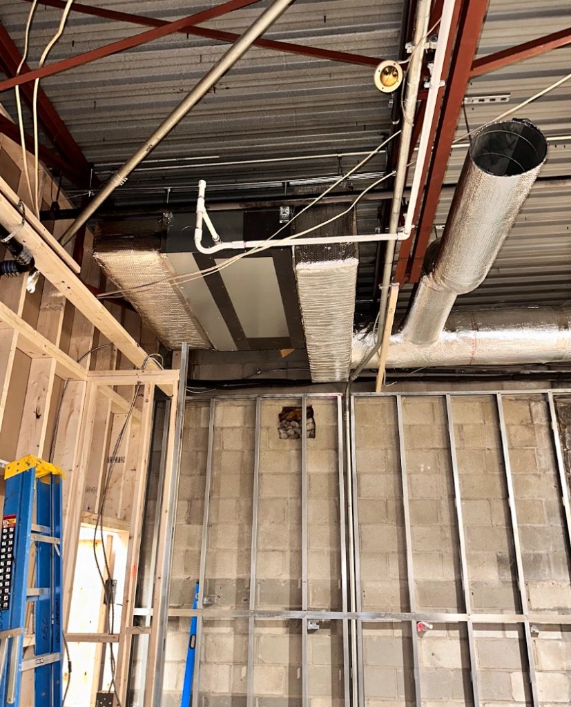 Commercial custom ductwork installation with insulated trunk lines by NGC Sheetmetal in Boston