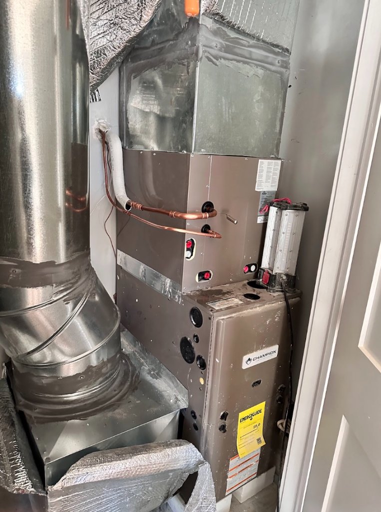 High-efficiency furnace installation by NGC Sheetmetal in Boston