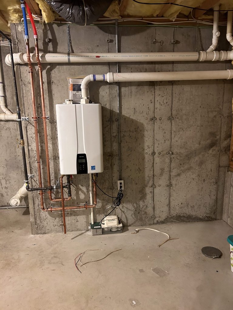 Tankless water heater installed by NGC Sheetmetal in a Greater Boston property