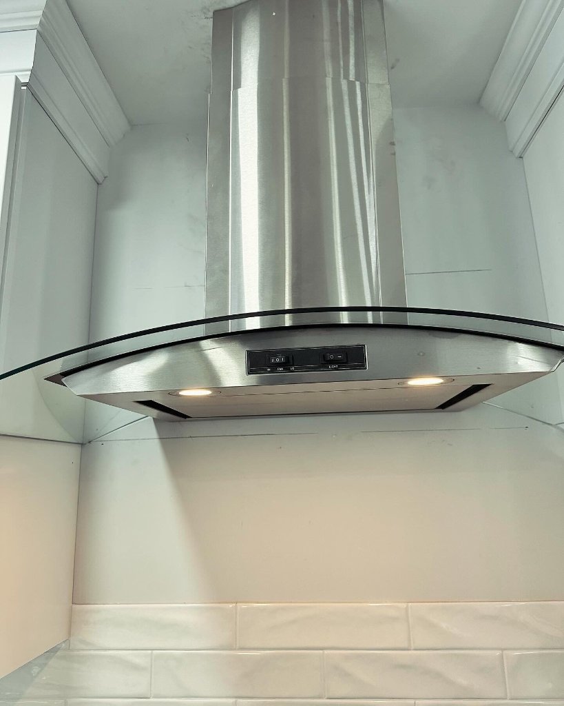 Stainless steel range hood ventilation installed by NGC Sheetmetal in Greater Boston