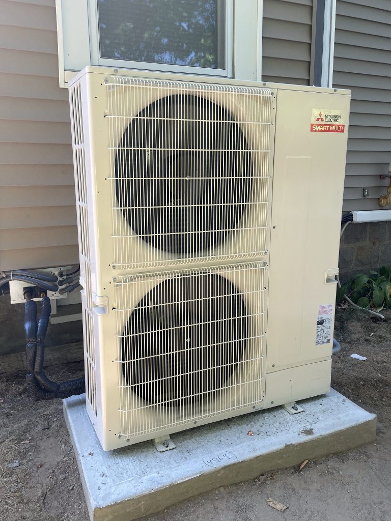Ductless mini-split outdoor condenser installed by NGC Sheetmetal in Greater Boston