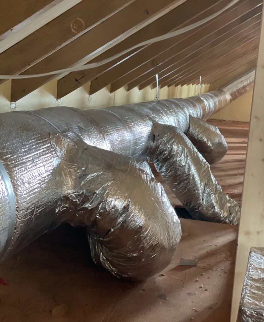 Insulated flexible ductwork installed in attic by NGC Sheetmetal in Boston