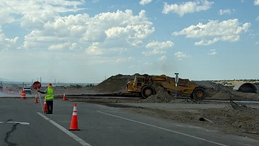 Earthmovers grading the Zebulon construction site