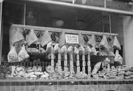 period butcher-shop window reference