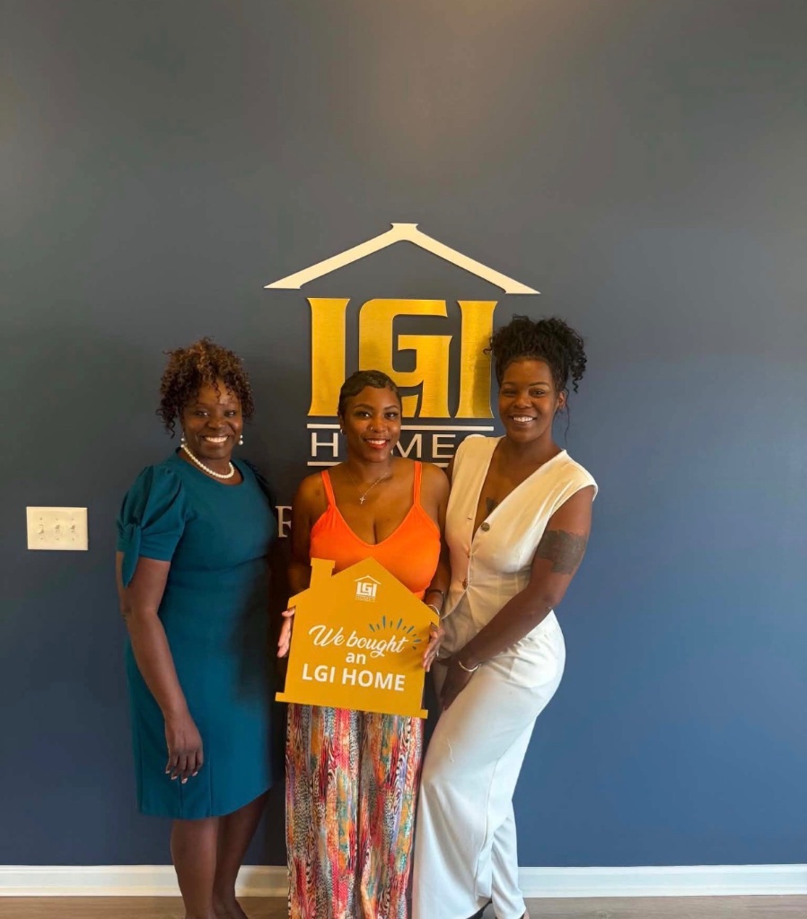 Clients celebrating buying their new LGI home