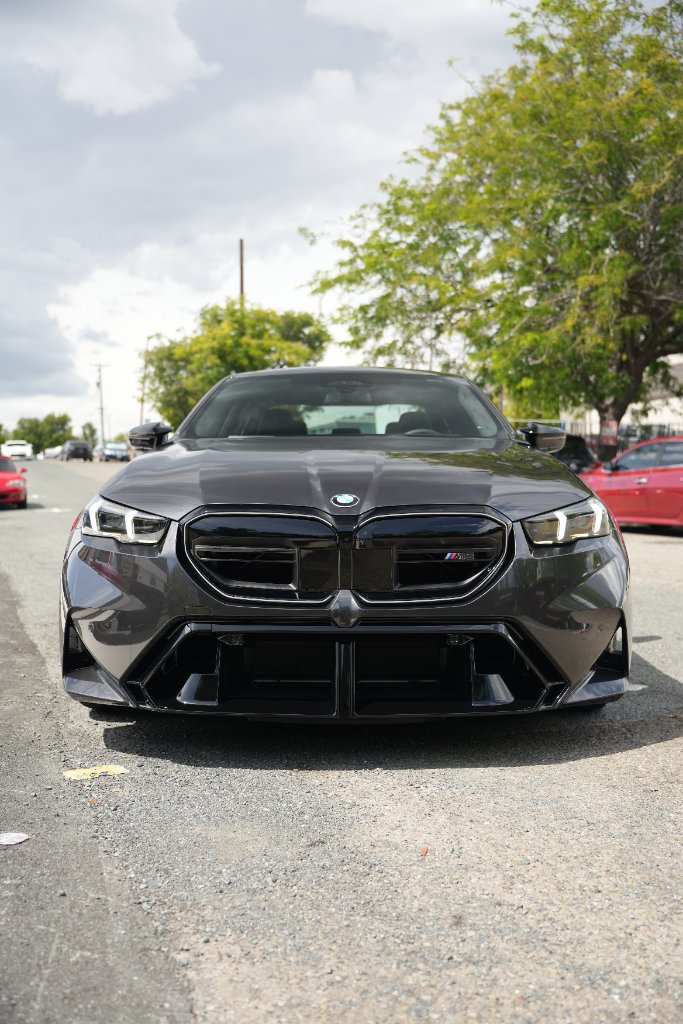 Dark grey BMW M5 with front PPF protection