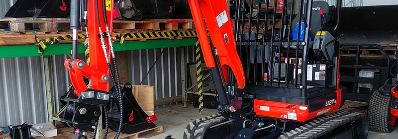 Kubota U27-4 mini excavator fitted with Agriforest grapple, available for business-to-business excavator hire across Canterbury