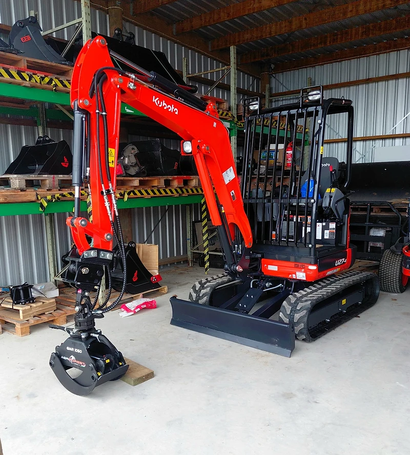 Kubota U27-4 mini excavator fitted with Agriforest grapple, available for business-to-business excavator hire across Canterbury
