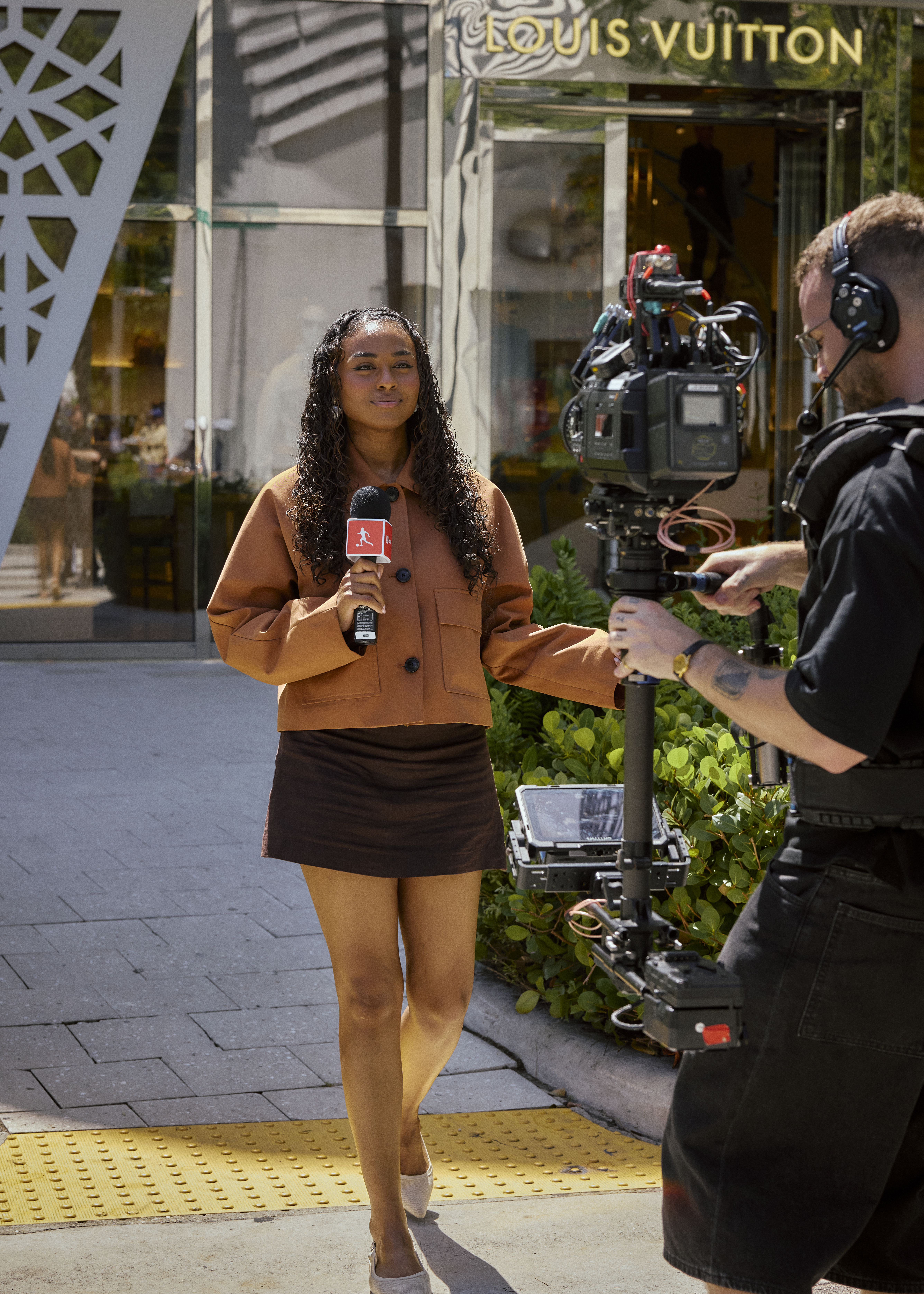 VS1 Games presenter outside Louis Vuitton in the Miami Design District