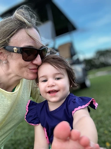 Kathleen C. Thompson with her daughter.