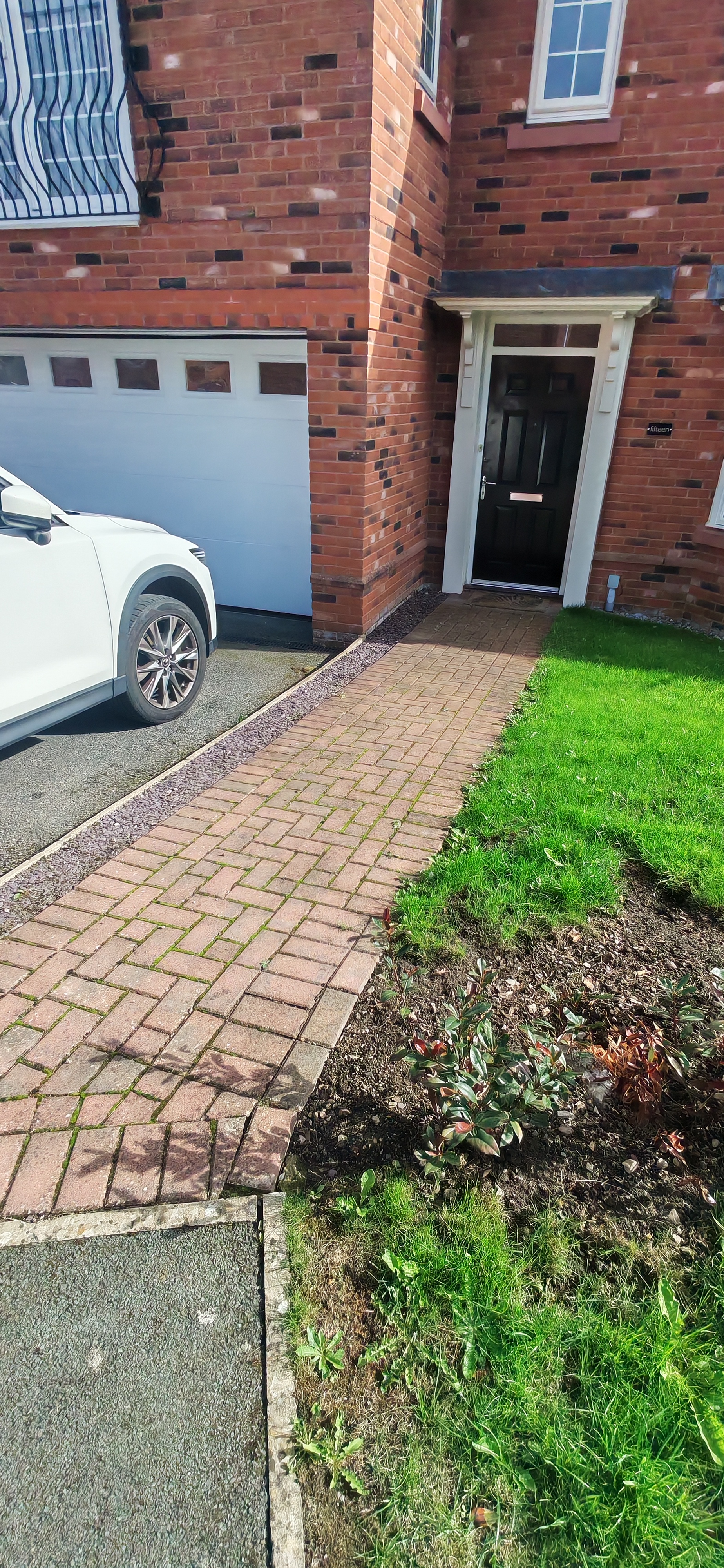 Before: Porcelain Patio Walkway in Shropshire — garden before landscaping work by Shropshire Landscaping & Design